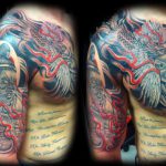 Japanese style chest and arm tattoo