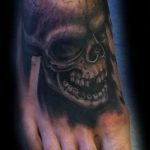 Skull foot tattoo