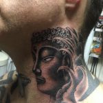 Buddha neck tattoo