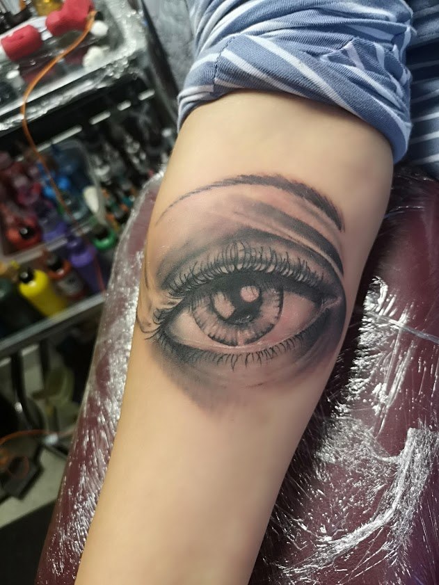 Photo realistic eye tattoo
