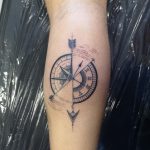 Arrow compass tattoo